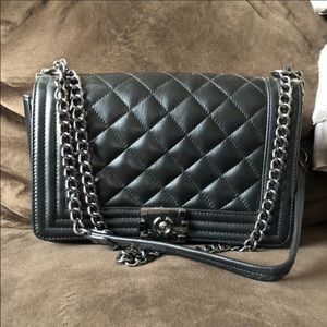 Real leather black quilted purse.